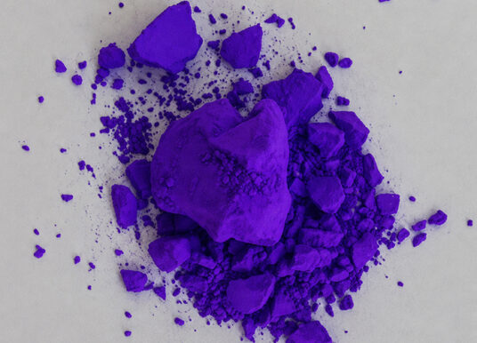 Purple cooling fabric shows lower temperatures than white cotton in outdoor tests